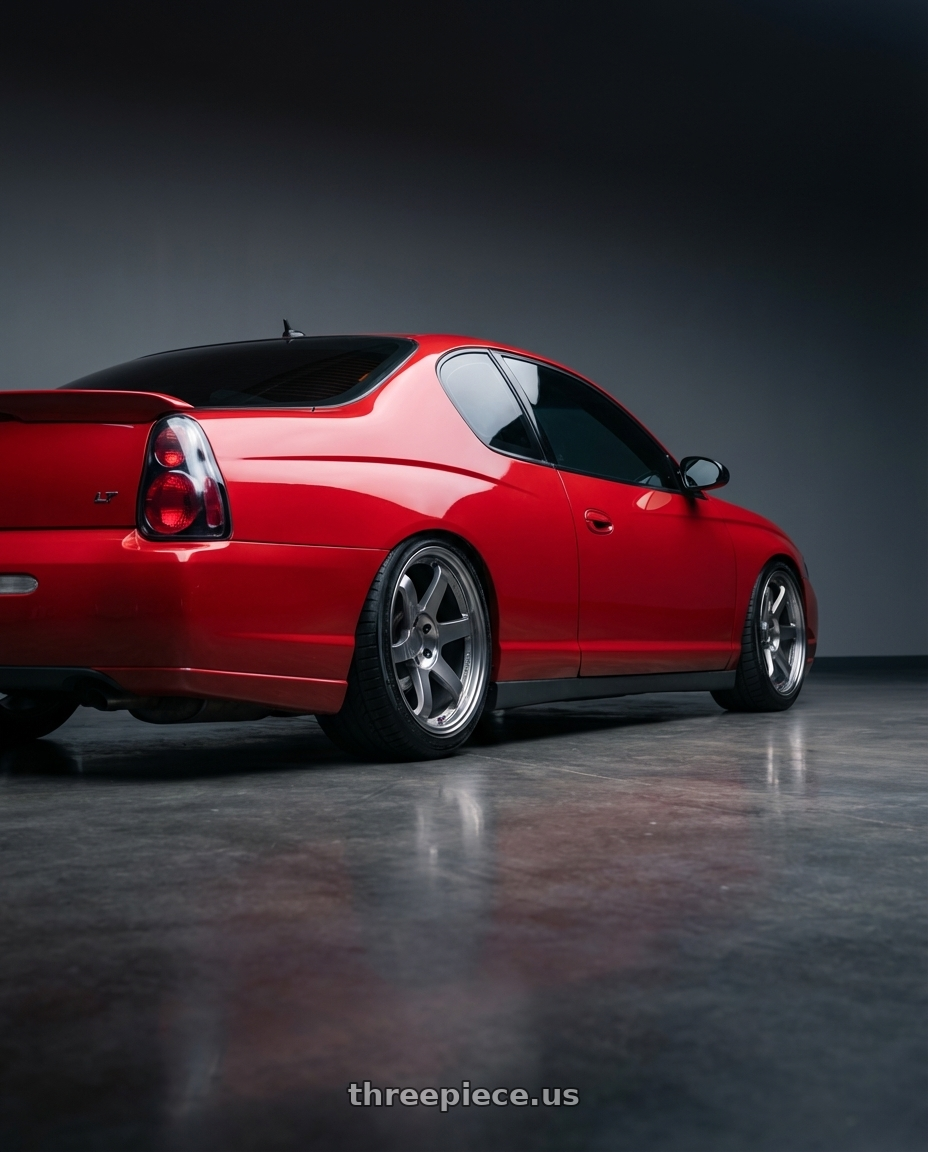 2006 Monte Carlo LT with Volk Racing TE37SL 5x112 19x9.5 +22 FORMULA SILVER wheels rear three quarter view slight stretch tires