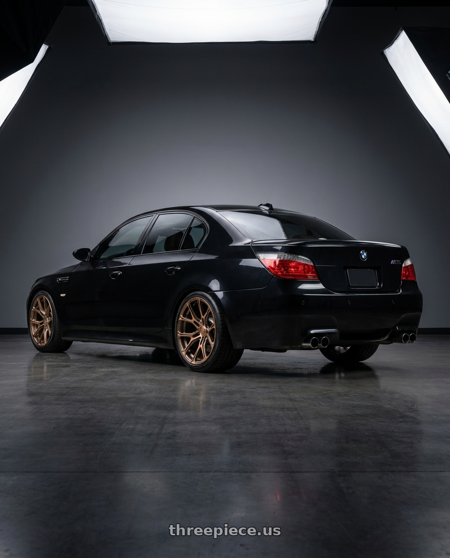 2008 BMW M5 with Rohana RFX19 5x112 19x8.5 +25 Machine Bronze wheels rear three quarter view square tires