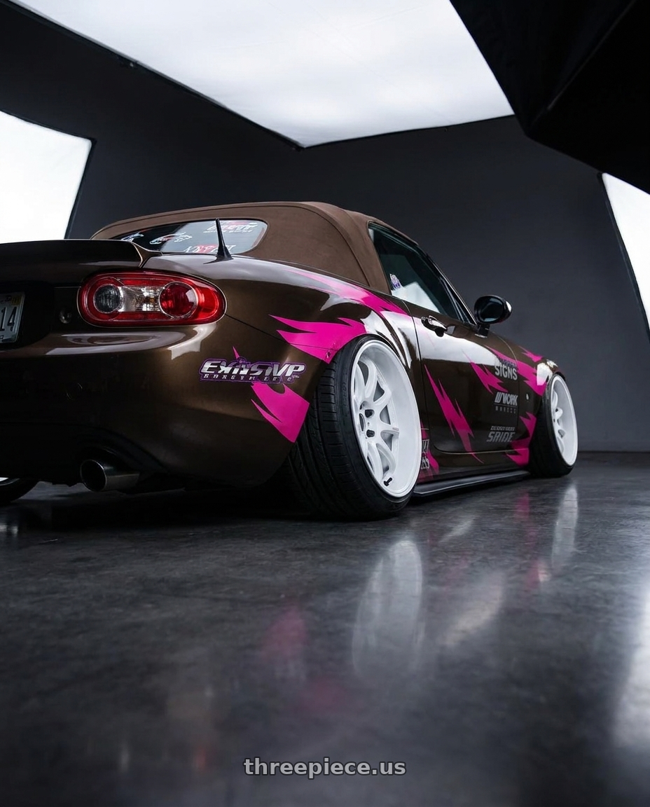 2012 Mazda miata with Work Emotion D9r 5x100 18x10.5 +15 White wheels rear three quarter view extreme stretch tires