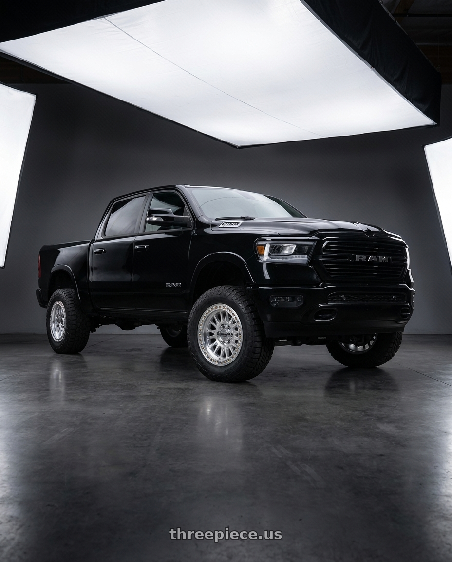 2019 Ram 1500 Laramie with KMC KM552 IMS 6X139.7 18x9 +0 GLOSS SILVER W/ MACHINED FACE wheels