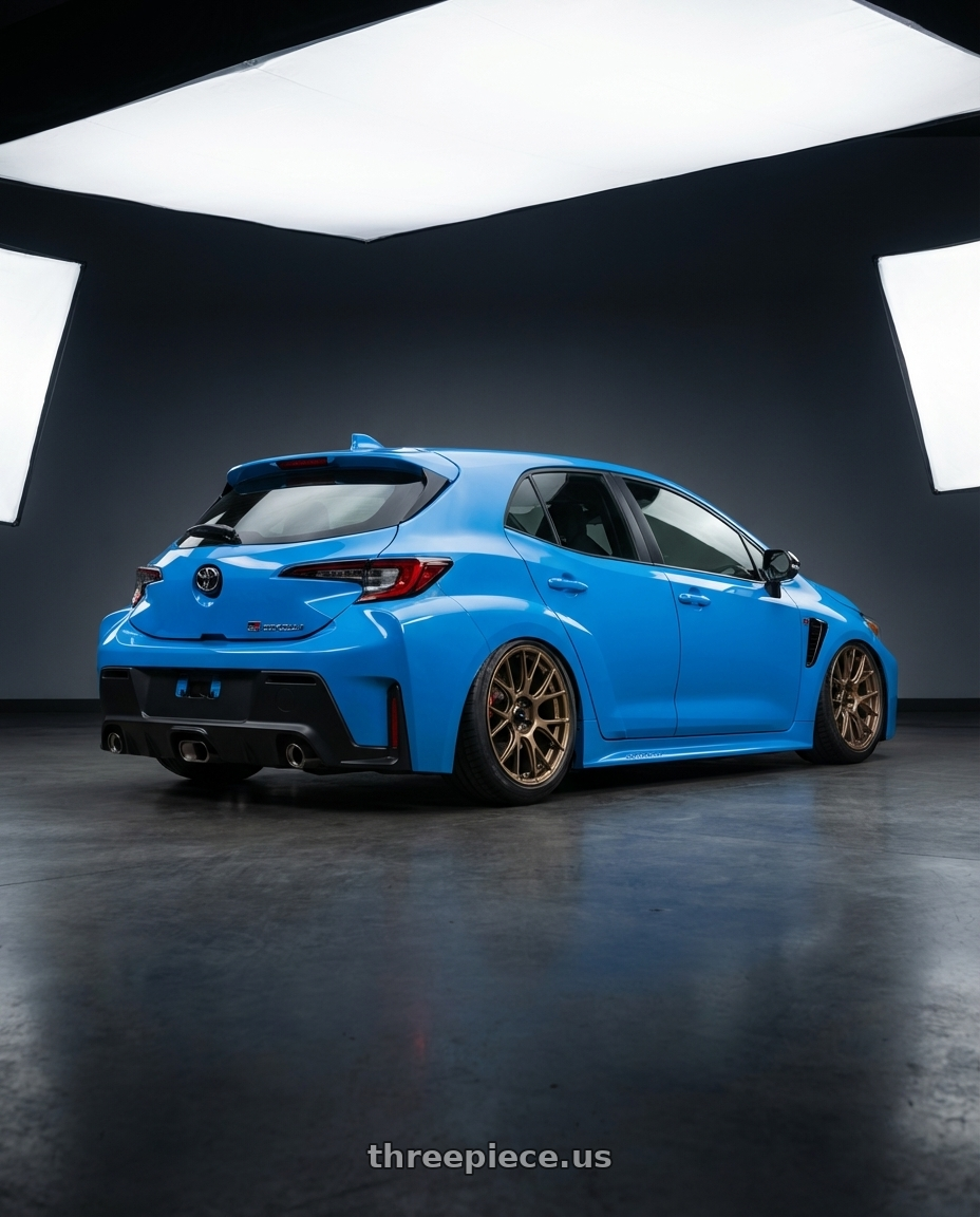 2024 Toyota GR Corolla with Konig Ampliform 5x114.3 18x9.5+35 Gloss Bronze wheels rear three quarter view slight stretch tires