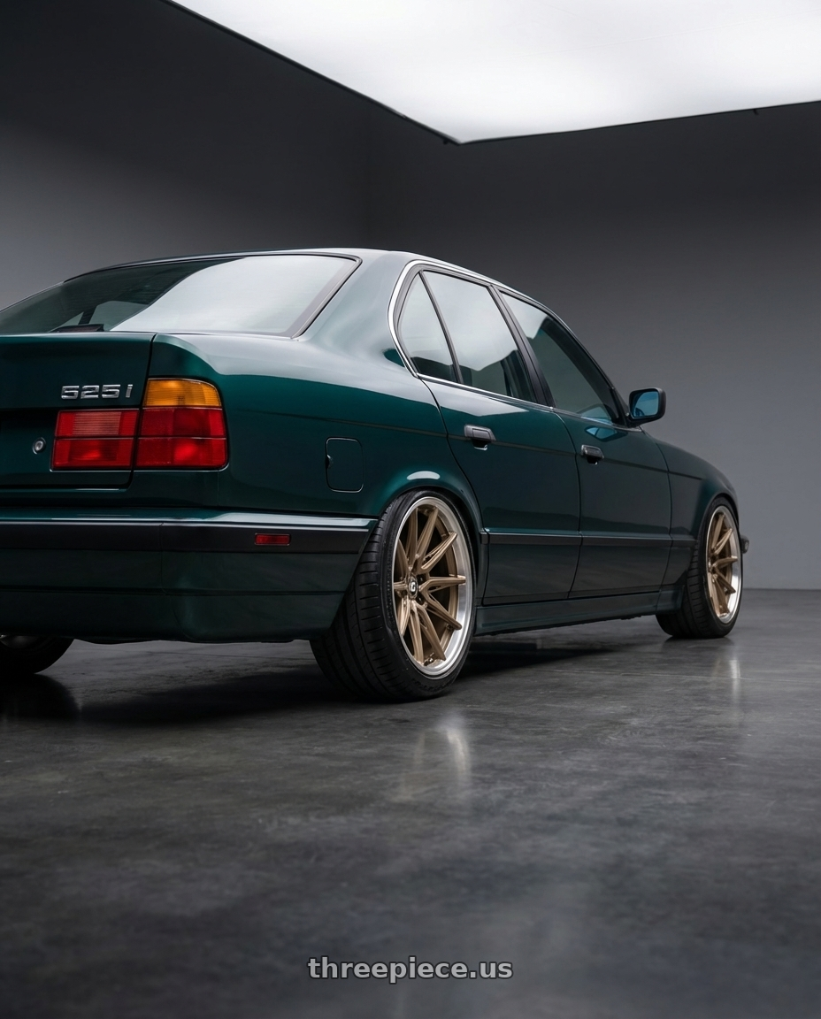 1991 BMW 525i Island Green with Brada Wheels CX2 5x112 19x9 +20 Satin Bronze wheels rear three quarter view slight stretch tires