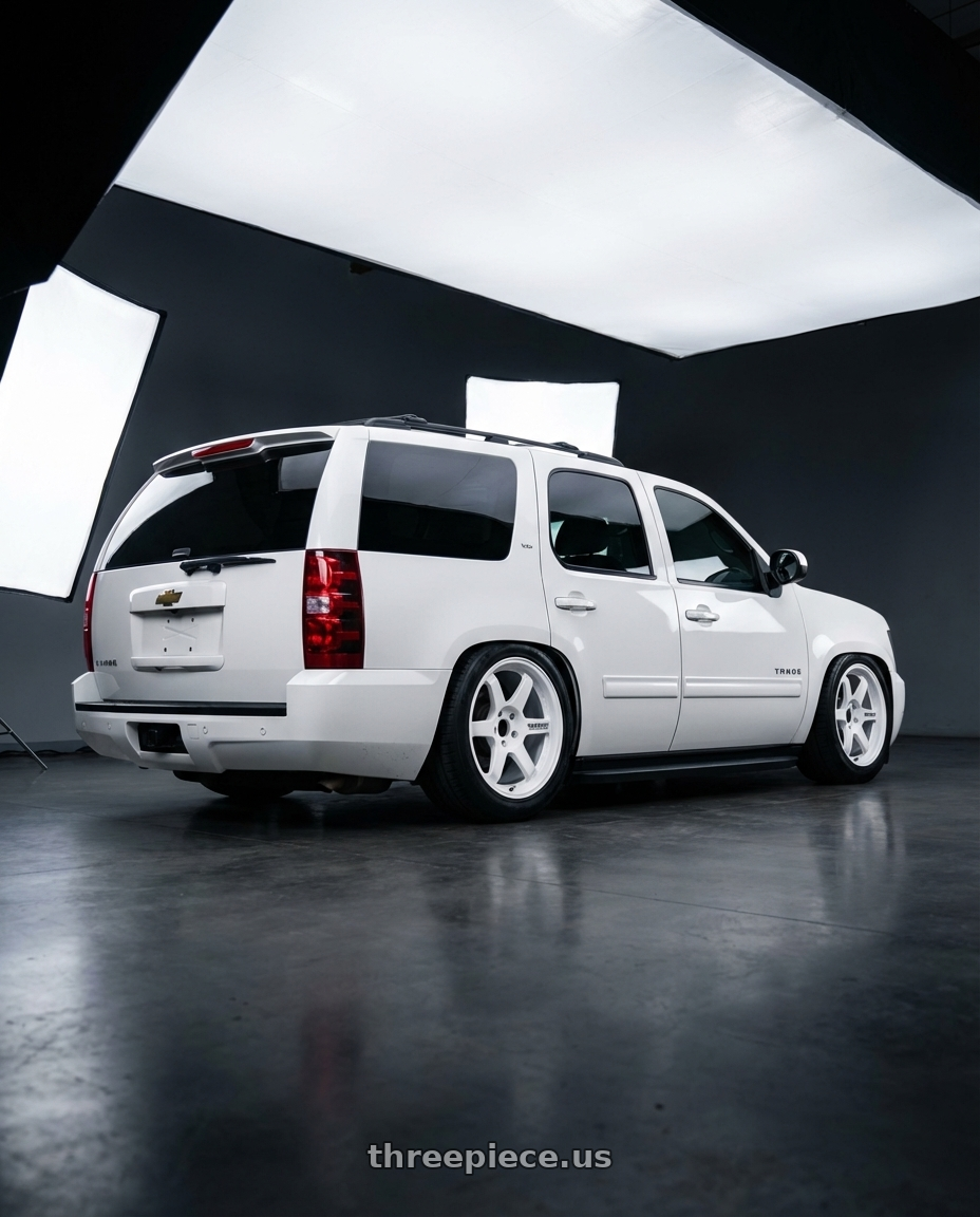 2011 Chevy Tahoe  with Volk Racing TE37 Gravel 5x114.3 15x7.0+35 White wheels rear three quarter view slight stretch tires