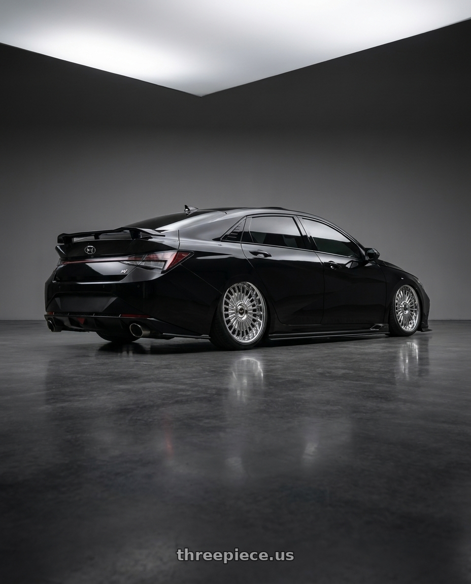 2023 Hyundai Elantra n with Work Emitz Chrome 5x114.3 19x8.5 +38 wheels rear three quarter view slight stretch tires