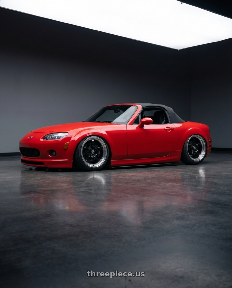 2012 Mazda MX-5 Miata NC with Forgestar D5 Drag 5x114.3 17x5 -21 Gloss Black Machined wheels rear three quarter view slight stretch tires