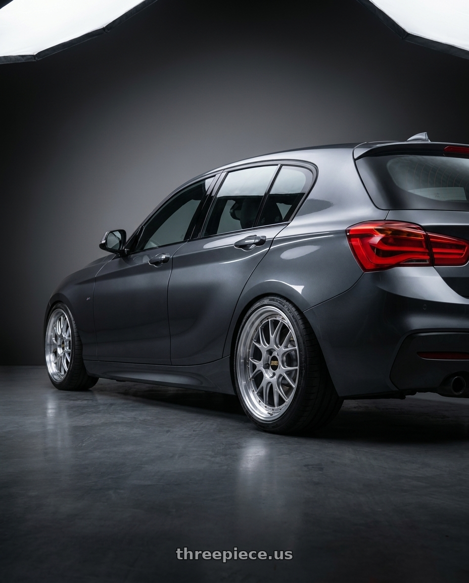 2018 bmw m140i with BBS LM-R 5x120 19x8.5+28 Diamond Silver wheels rear three quarter view meaty tires