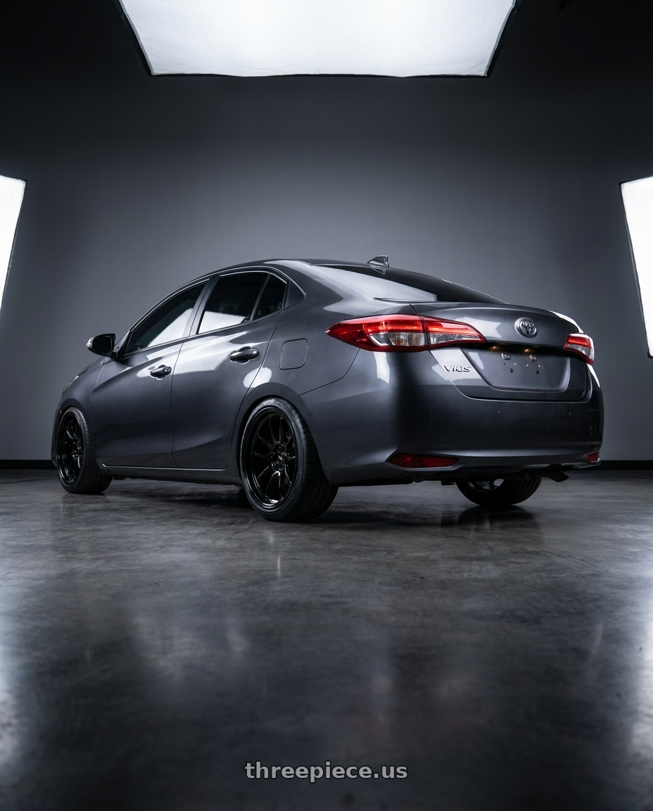 2018 TOYOTA VIOS with Fittipaldi FS369B 5X115/5X120 22x9.5 +15 Gloss Black wheels rear three quarter view extreme stretch tires