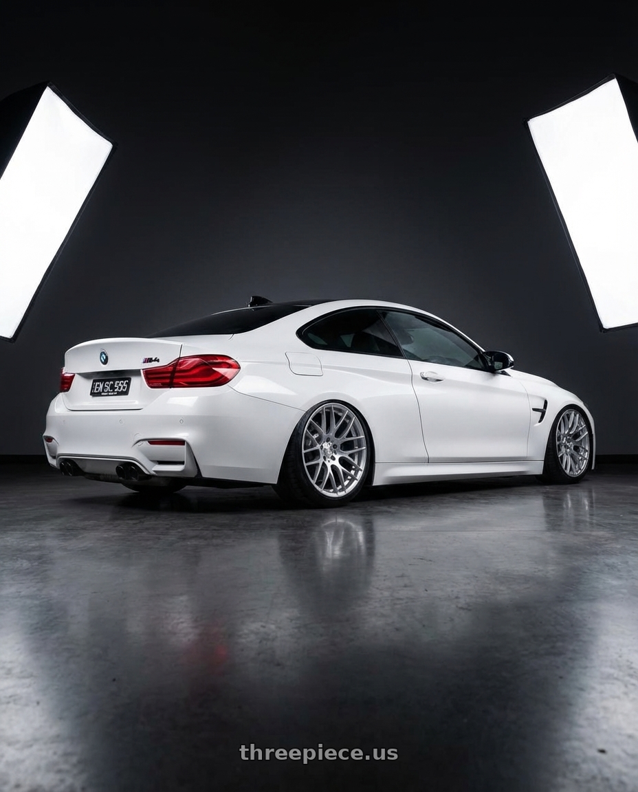 2018 BMW M4 F82 with Avant Garde Wheels M359 5X120 19x9 +35 Hyper Silver wheels rear three quarter view slight stretch tires