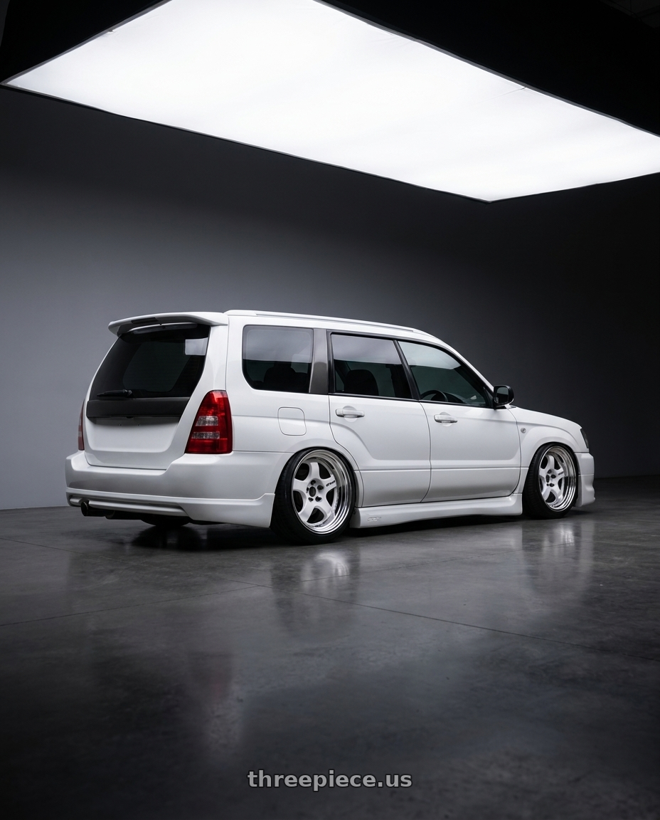 2002 subaru forester with Work Meister S1 2P 5x100 15x6.5+45 A Disk White wheels rear three quarter view slight stretch tires