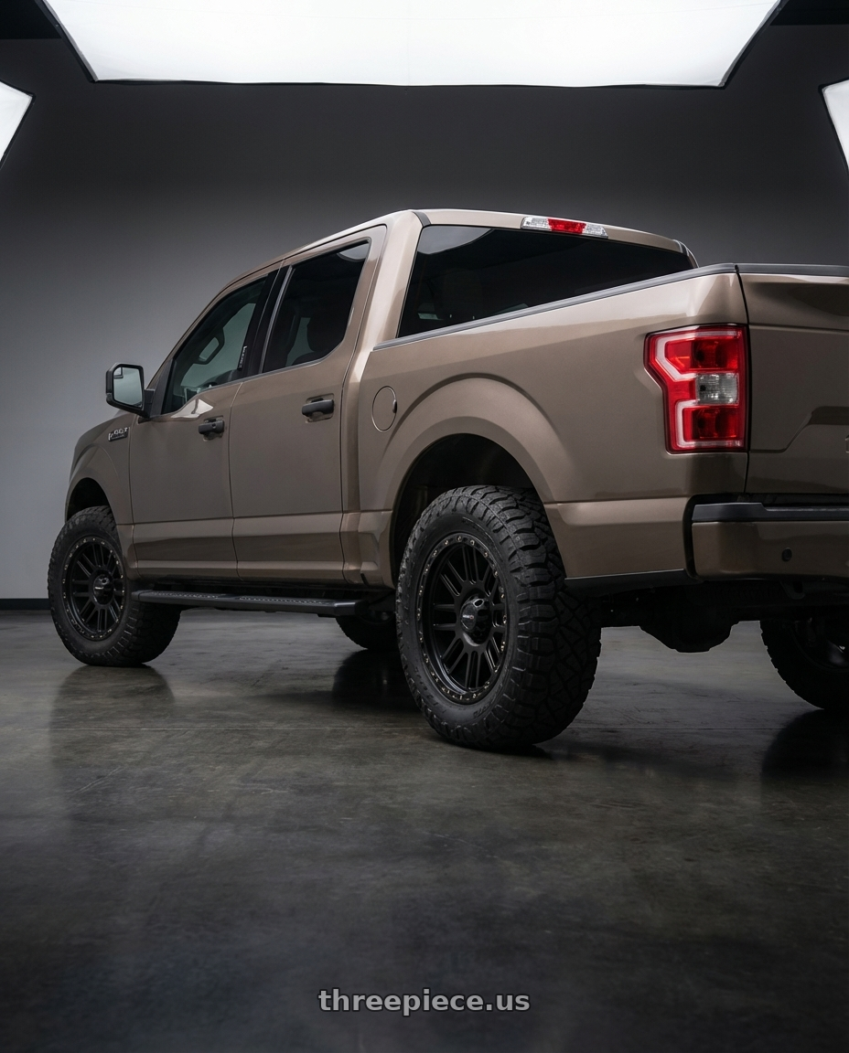 2019 Ford F-150 with Vision Off-Road 111 Nemesis 6x135 20x9+0 Matte Black wheels rear three quarter view meaty tires