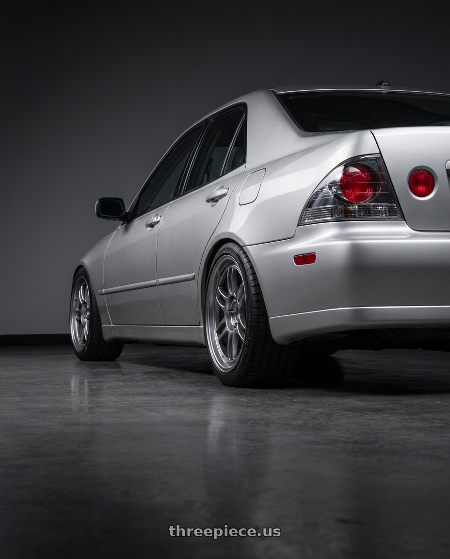 2001 Lexus IS300 with Enkei RPF1 5x114.3 17x9+45 SBC wheels rear three quarter view square tires