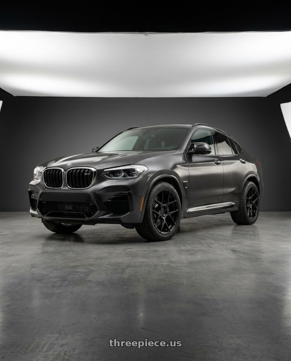 2023 BMW X4 with Aodhan AFF2 5x112 20x9+30 Matte Black wheels front three quarter view stock stance