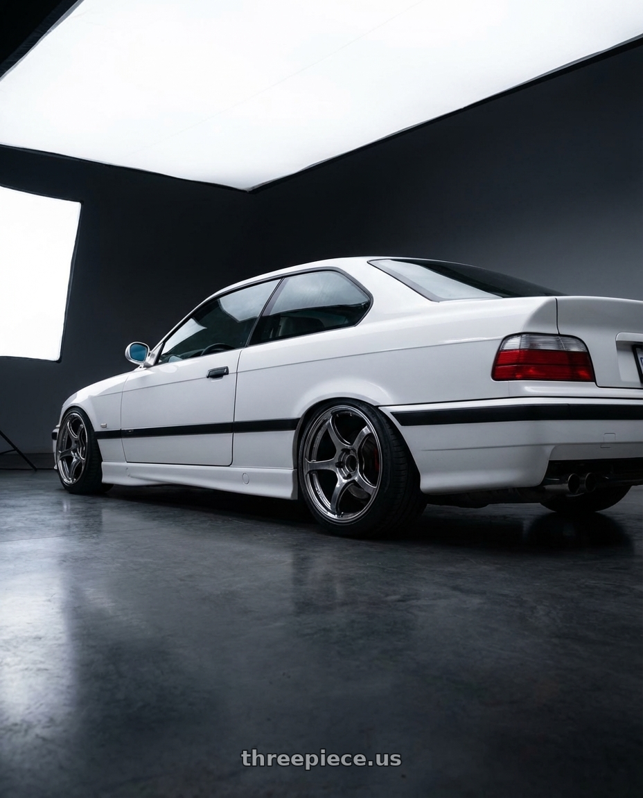 1998 BMW M3 with Advan Racing RG-4 5x120 18x8.0 +45 RACING HYPER BLACK & RING wheels rear three quarter view slight stretch tires