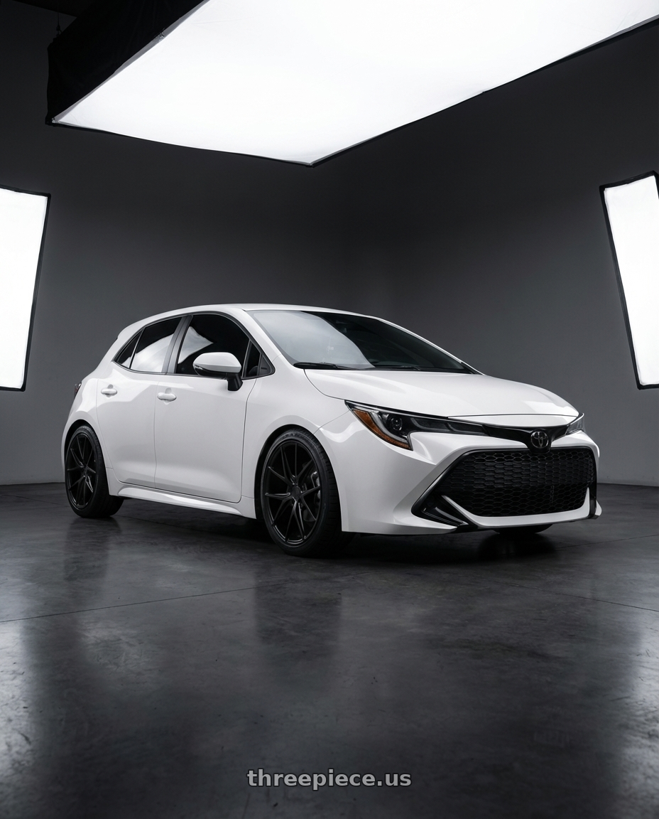 2023 Toyota Corolla Hatchback with Niche 1PC M117 MISANO 5X114.3 18X8 +42 MATTE BLACK wheels front three quarter view lowered stance