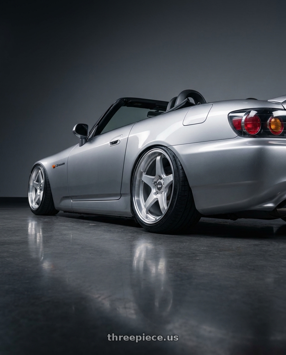 2009 Honda S2000 with ESR Wheels APEX SERIES AP5 5x114.3 18x10.5 +22 Hyper Silver wheels rear three quarter view slight stretch tires