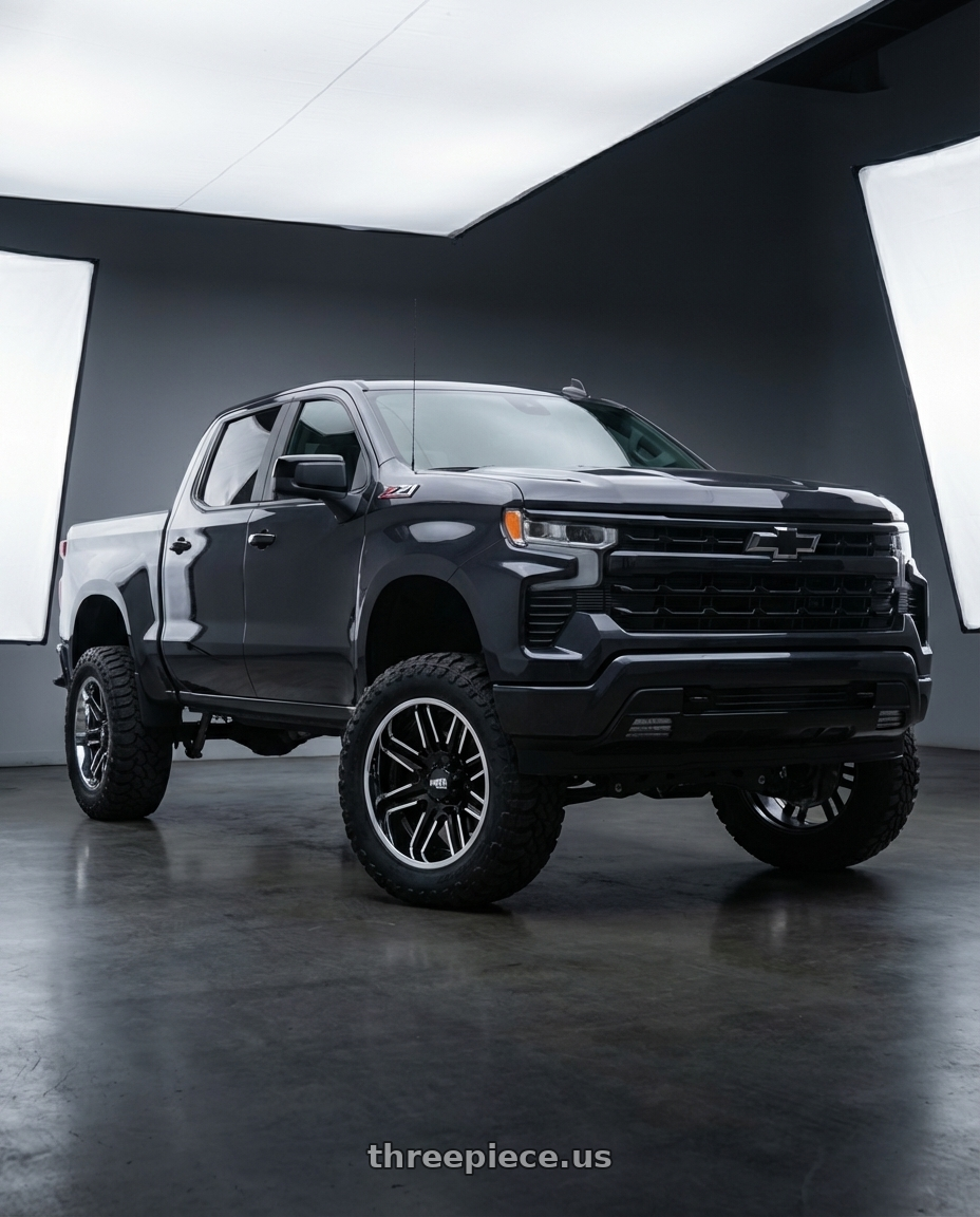 2023 Chevrolet Silverado 1500 with Moto Metal MO202 6X139.7 22X12 -44 GLOSS BLACK MACHINED CENTER CHROME LIP wheels front three quarter view lifted stance