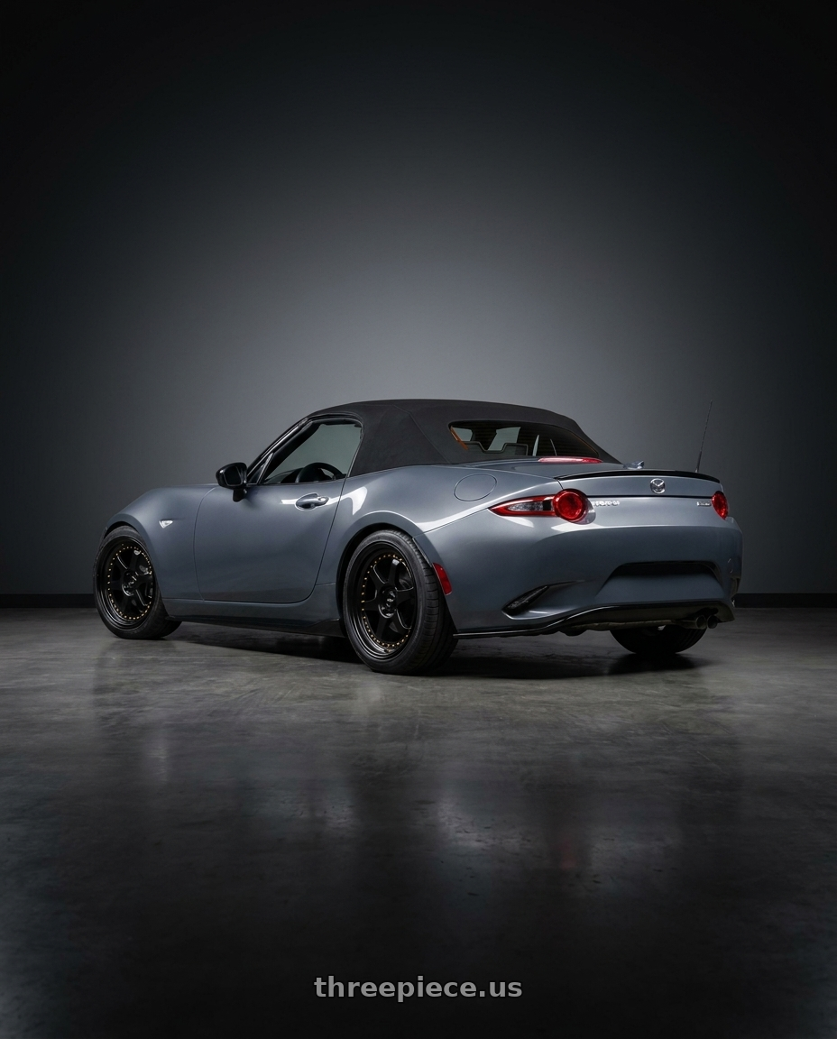 2020 Mazda mx-5 Miata club soft top polymetal grey with Vors VR7 4x100/4x114.3 16x7  +38 All Black Gold Rivet wheels rear three quarter view square tires