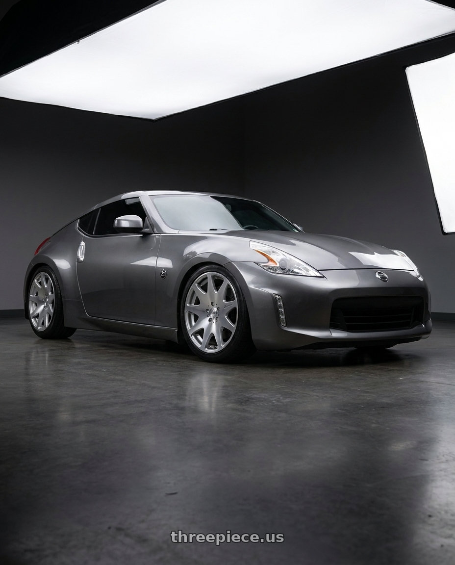 2014 Nissan 370Z with MRR HR3 5x114.3 19x8.5  +35 Silver Machine Face wheels front three quarter view lowered stance