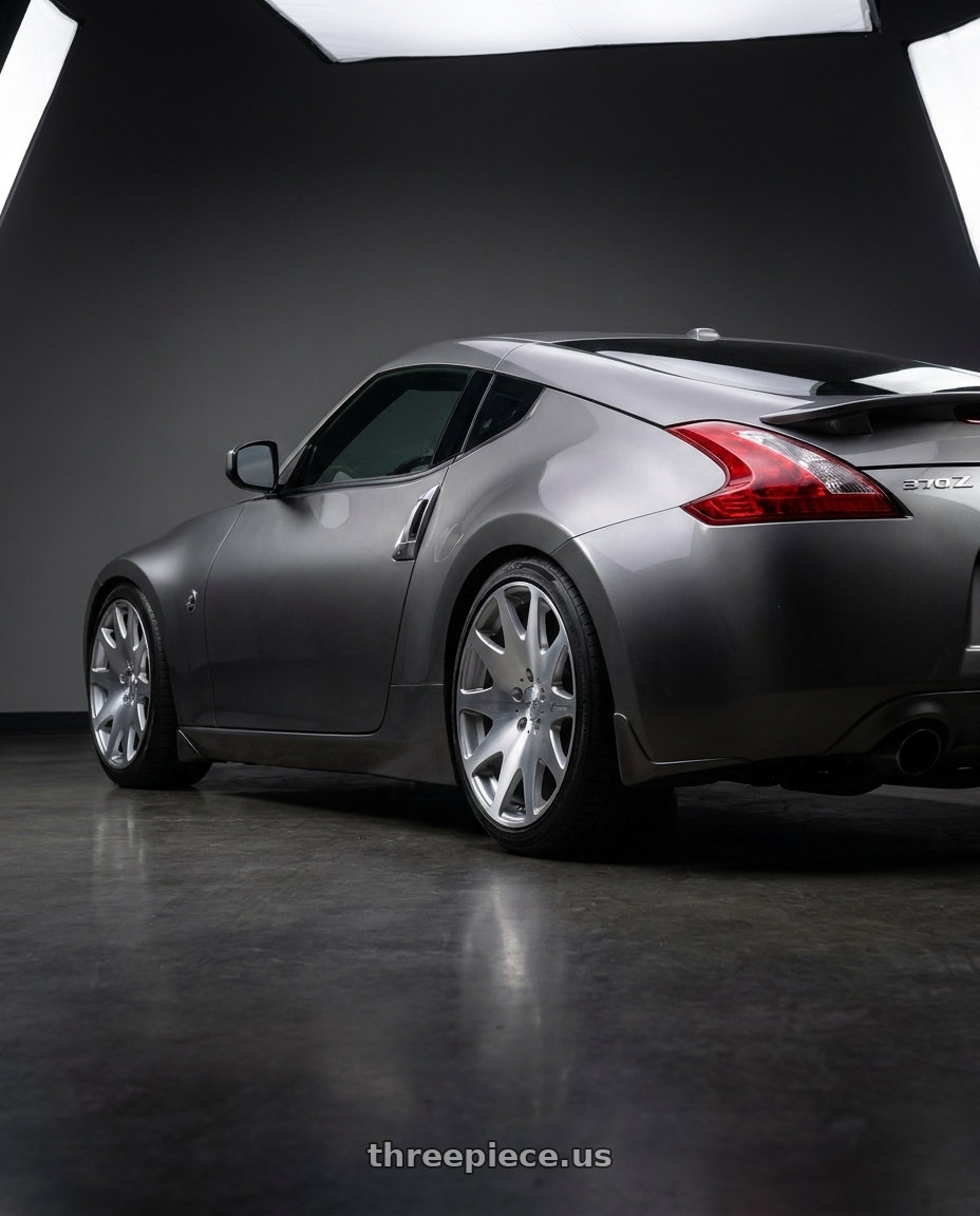 2014 Nissan 370Z with MRR HR3 5x114.3 19x8.5  +35 Silver Machine Face wheels rear three quarter view square tires