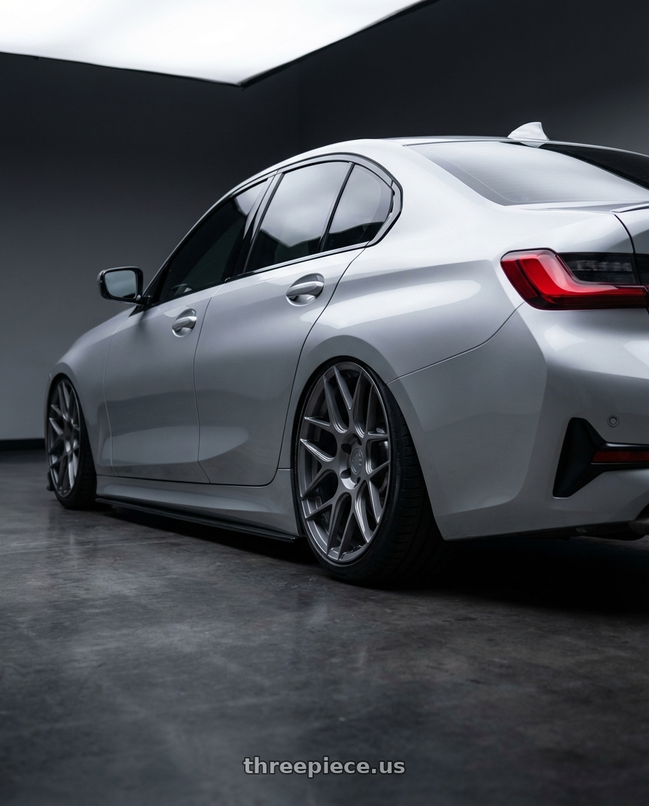 2023 BMW 3 Series G20 with Aodhan AFF2 5x112 19x9.5+35 Matte Gray wheels rear three quarter view slight stretch tires