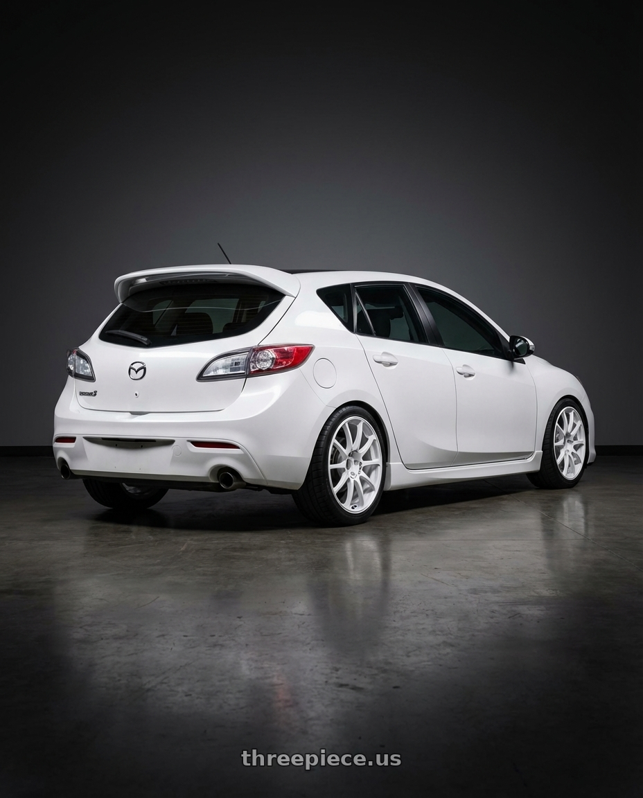 2012 Mazda Mazdaspeed3 with Advan RCIII 5x114.3 18x8.5+38 White wheels rear three quarter view square tires