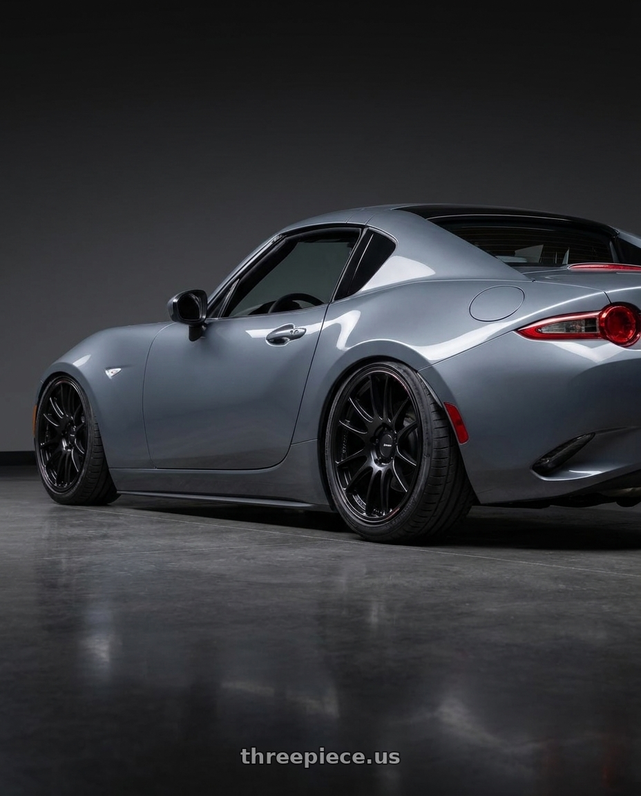2025 mazda mx5 rf nd3 with Enkei GTC02 4x100 17x7.5+35 Black wheels rear three quarter view square tires