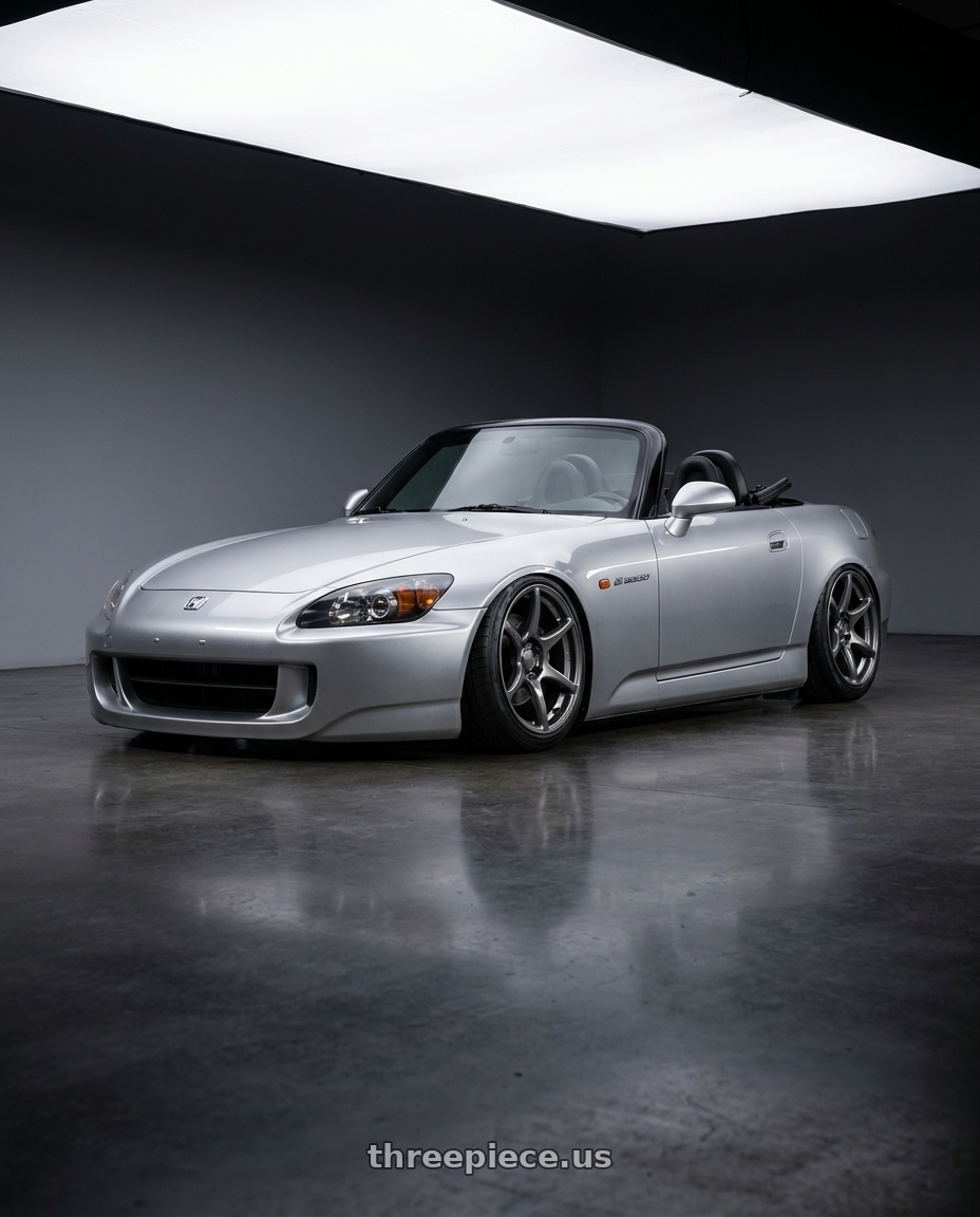 2009 Honda S2000 with Kansei K11G Tandem 5x114.3 18x9 12 Gunmetal wheels