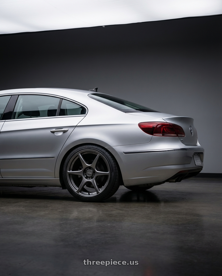 2015 Volkswagen CC with Kansei K11G Tandem 5X112 19x9.5 22 Gunmetal wheels rear three quarter view square tires