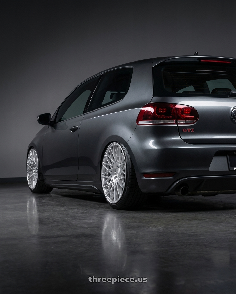 2013 Volkswagen GTI MK6 with Avant Garde Wheels M540 5X112 18x9 +48 Silver Machined wheels rear three quarter view slight stretch tires