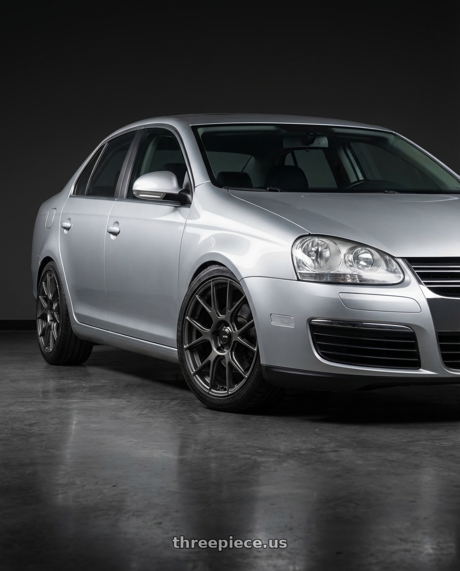 2009 Volkswagen Jetta GLI MK5 with Konig Ampliform 5x112 18x8.5+43 Dark Metallic Graphite wheels
