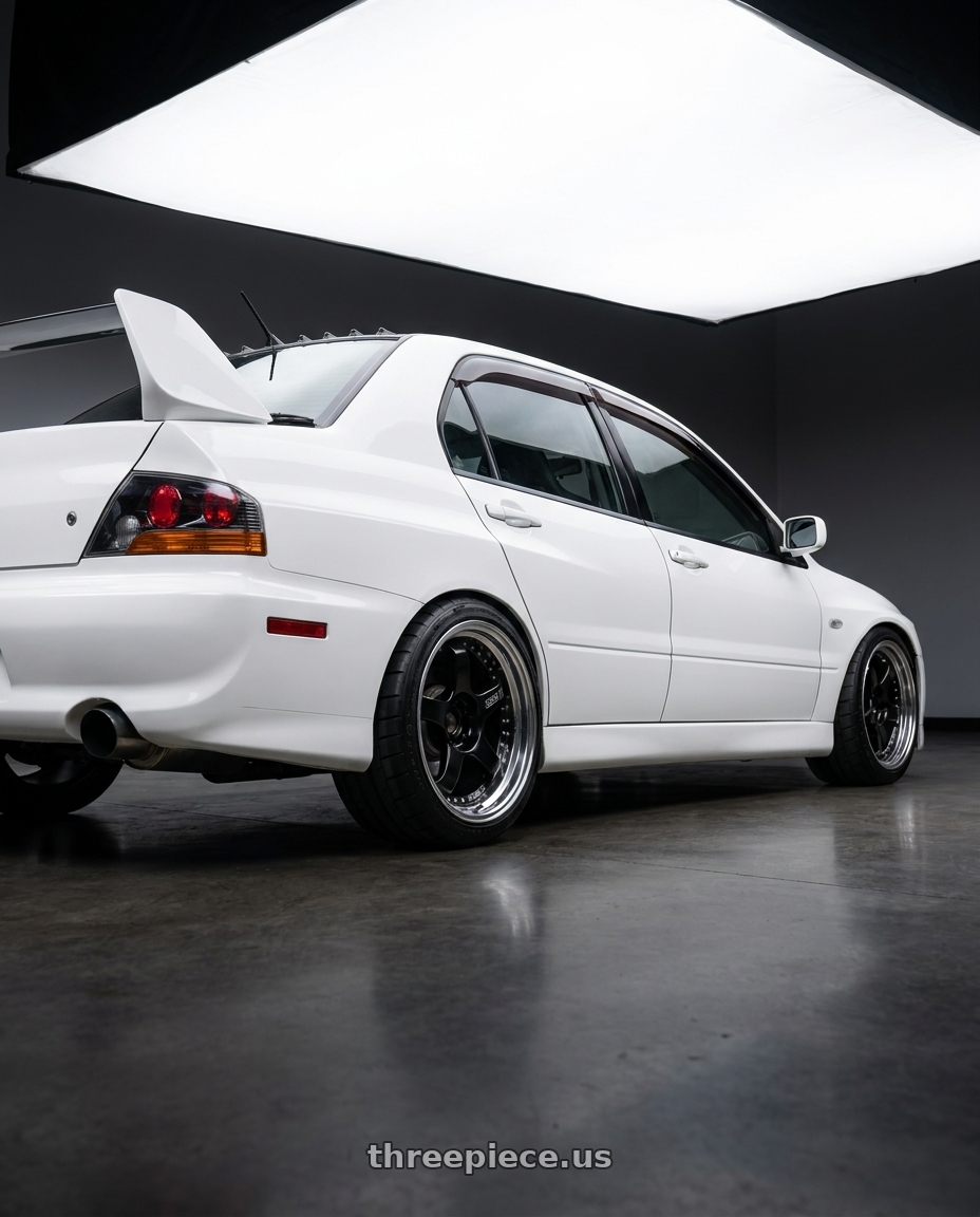 2006 mitsubishi evo with SSR Professor SP1 4X100 18X9.5+25 HP Disk Black wheels rear three quarter view square tires