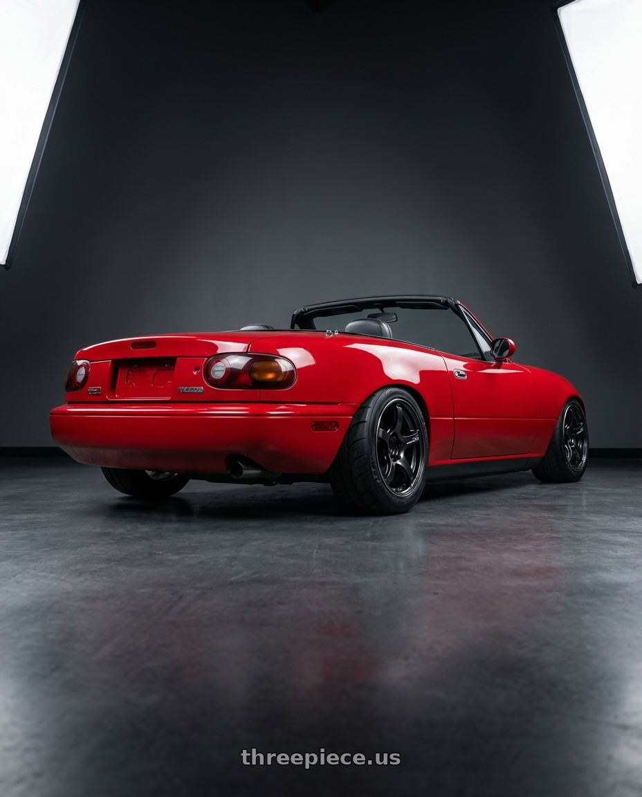 1991 mazda na miata with Advan Racing TC4 4x100 15x8.0 +35 BLACK GUNMETALLIC & RING wheels rear three quarter view meaty tires