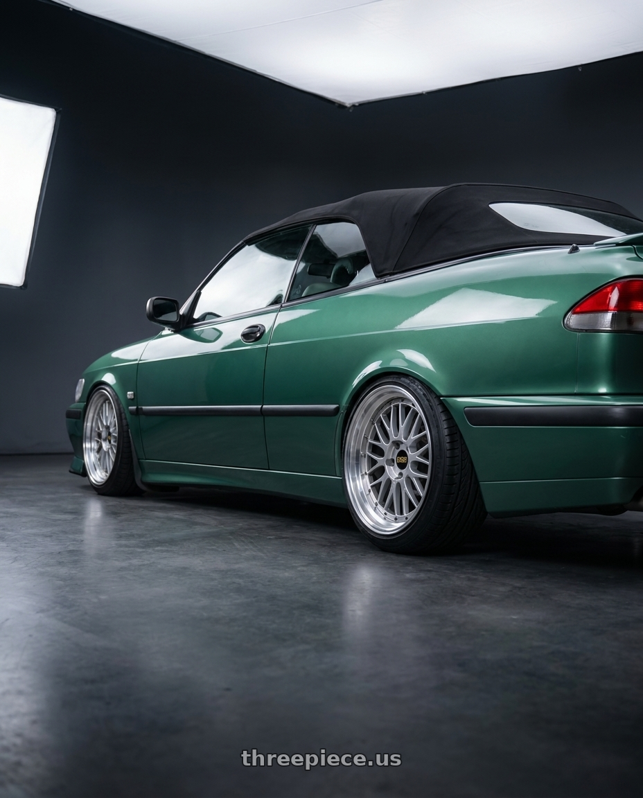 1999 Saab 9-3 with BBS LM 5x114.3 18x8.0+40 Diamond Silver wheels rear three quarter view extreme stretch tires