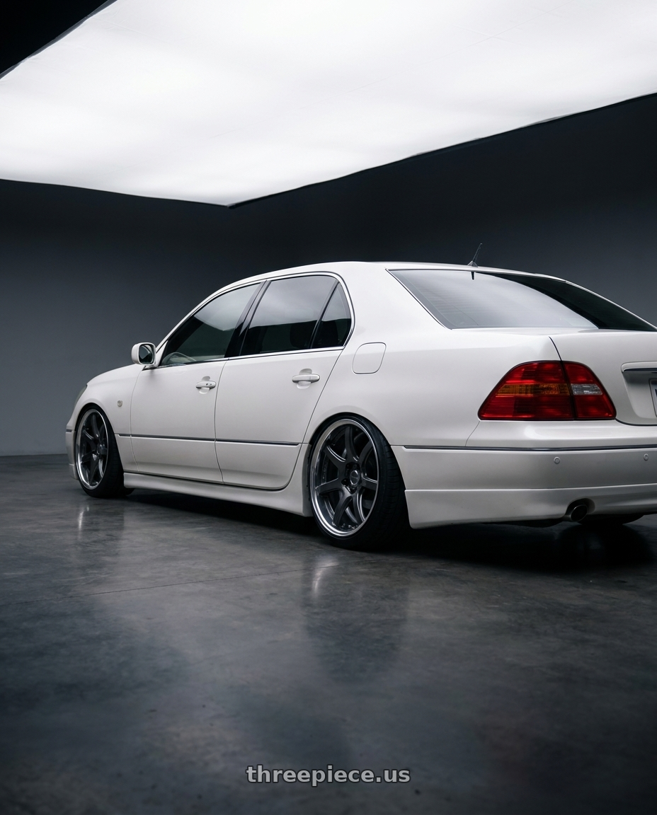2000 Toyota Celsior with Work Emotion T7R 2P wheels rear three quarter view slight stretch tires