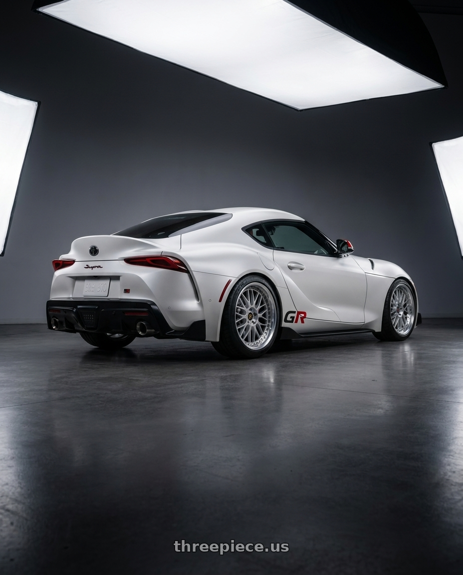 2026 toyota GR supra final with Work Vs-Xx 5x112 19x9+26 O Disk Light Grey Silver wheels rear three quarter view square tires