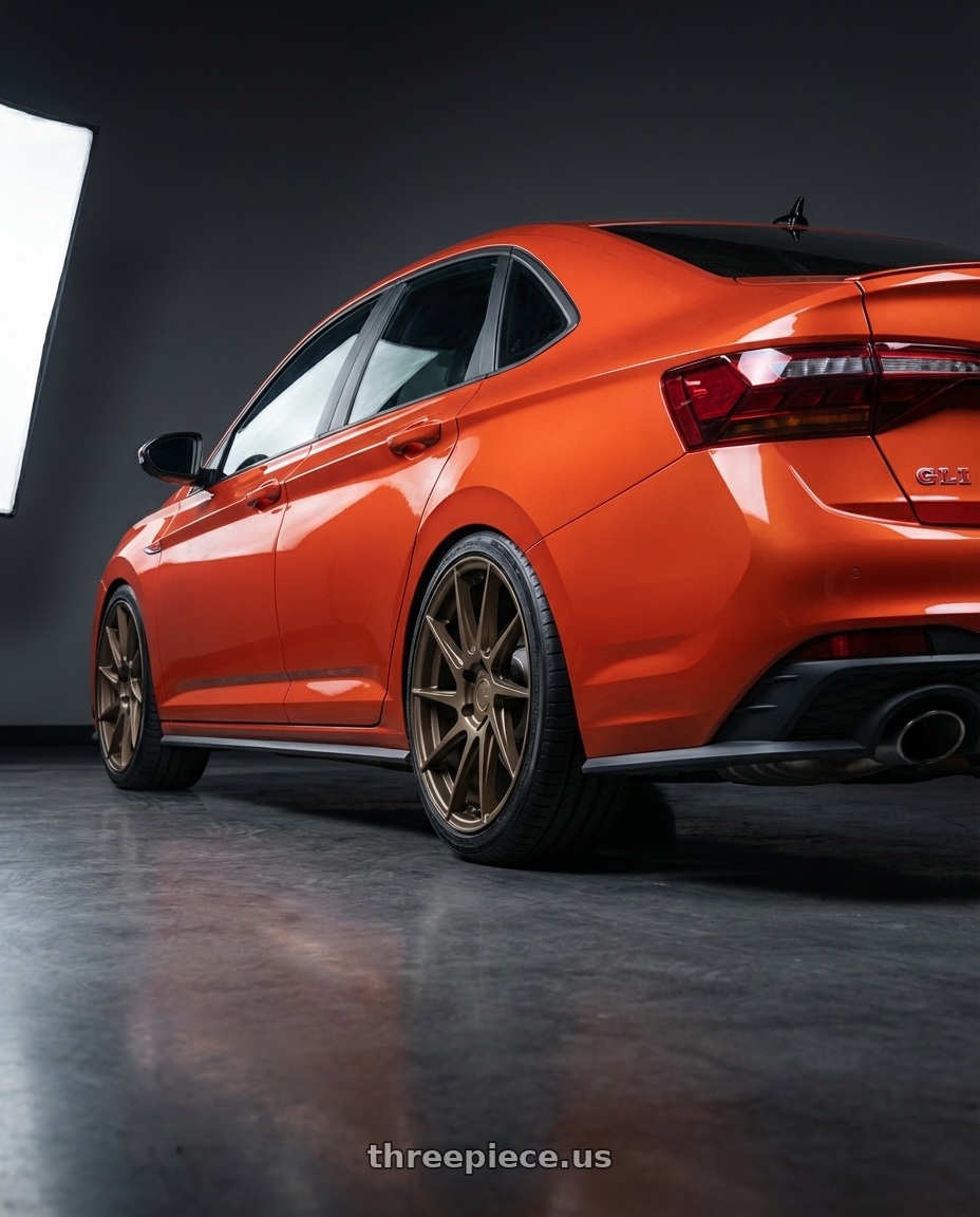 2023 Volkswagen Jetta GLI MK7 with Aodhan AH09 5x112 18x8.5 +35 Matte Bronze wheels rear three quarter view square tires