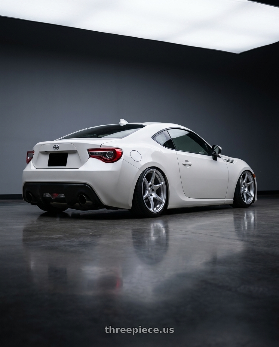 2016 Scion FR-S with Kansei K11S Tandem 5X100 17x9.5 12 Hyper Silver wheels rear three quarter view slight stretch tires