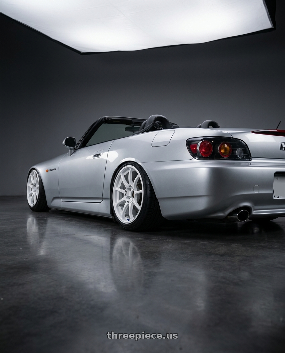 2009 Honda S2000 with Advan RCIII 5x114.3 17x7+45 White wheels rear three quarter view slight stretch tires