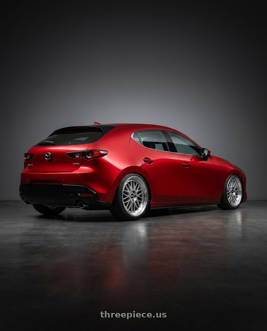 2024 Mazda 3 with BBS LM 5x114.3 19x8.5+43 Diamond Silver wheels rear three quarter view slight stretch tires