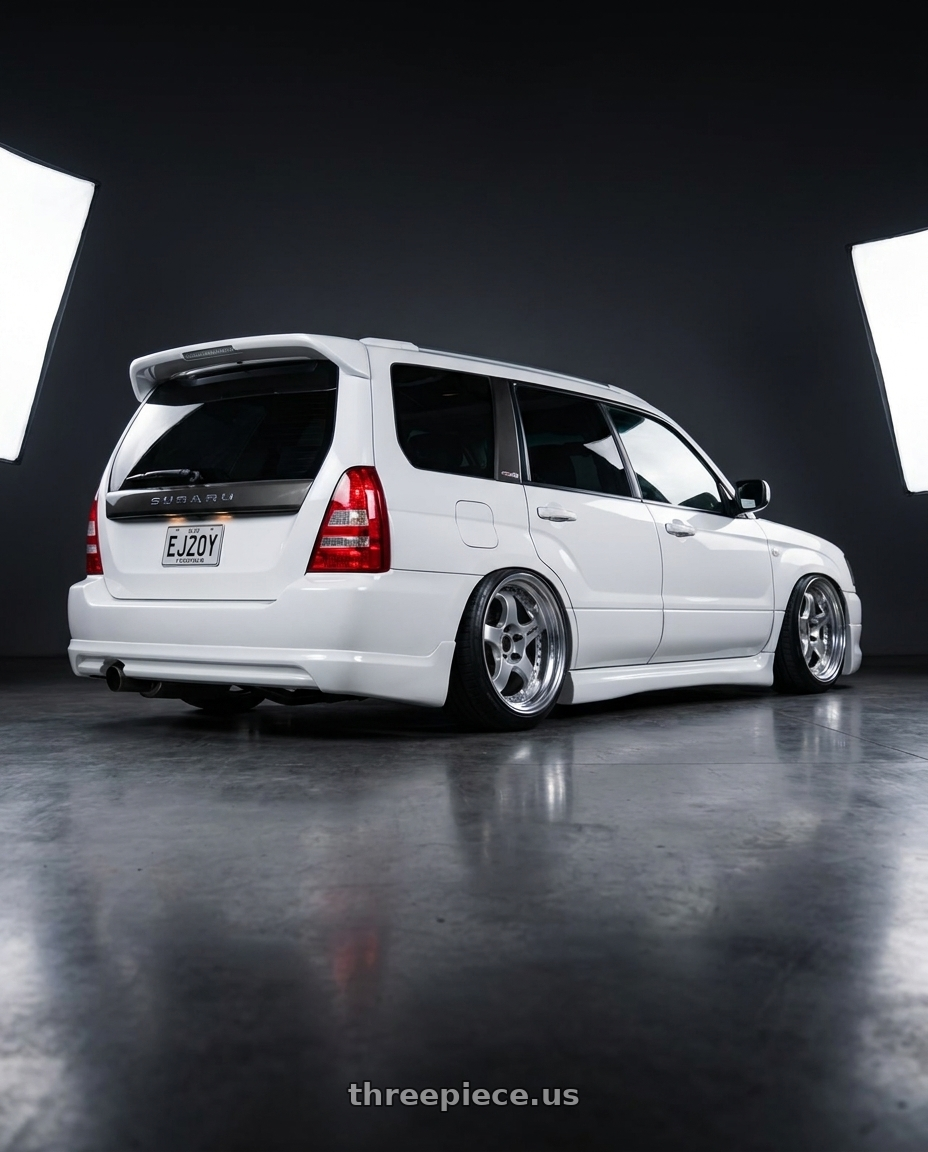 2002 subaru forester with Work Meister S1 3P 5x100 17x7+36 W Disk Silver wheels rear three quarter view slight stretch tires