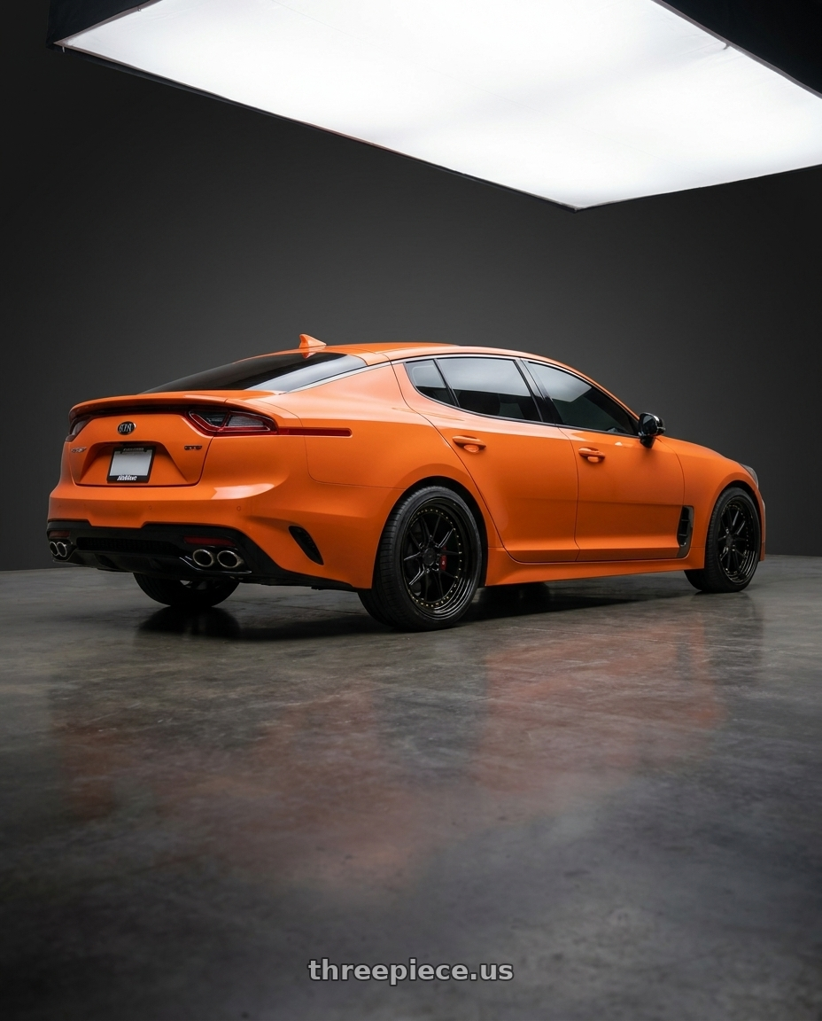 2019 KIA stinger gts  with Aodhan DS08 5x114.3 19x8.5+35 Gloss Black W /Gold Rivets wheels rear three quarter view square tires