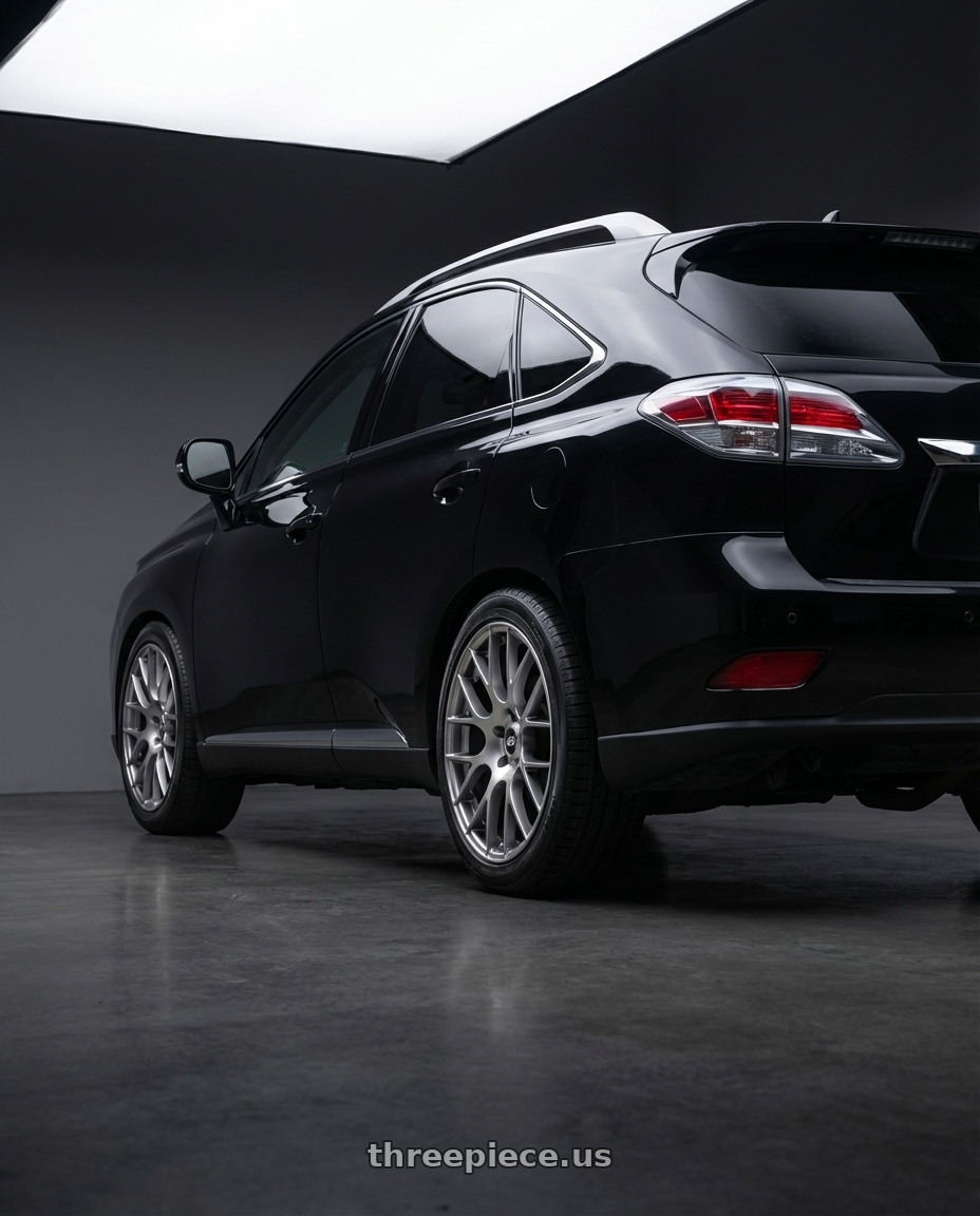 2011 Lexus RX350 with Enkei Raijin 5x114.3 18x8.5+35 Hyper Silver wheels rear three quarter view square tires