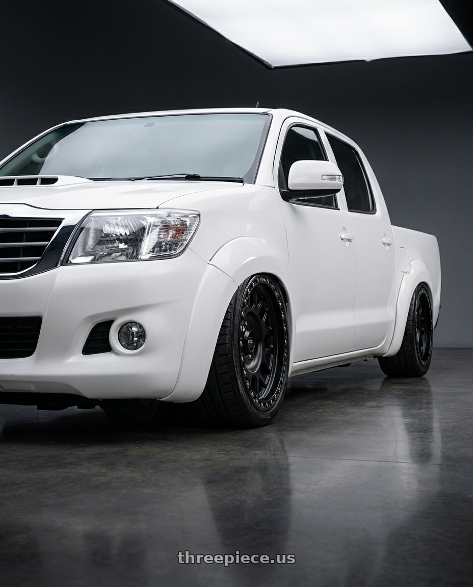 2009 Toyota hilux sr5 white with KMC KM234 GRENADE DESERT BEADLOCK 6X139.7 17X8.5 +0 SATIN BLACK wheels