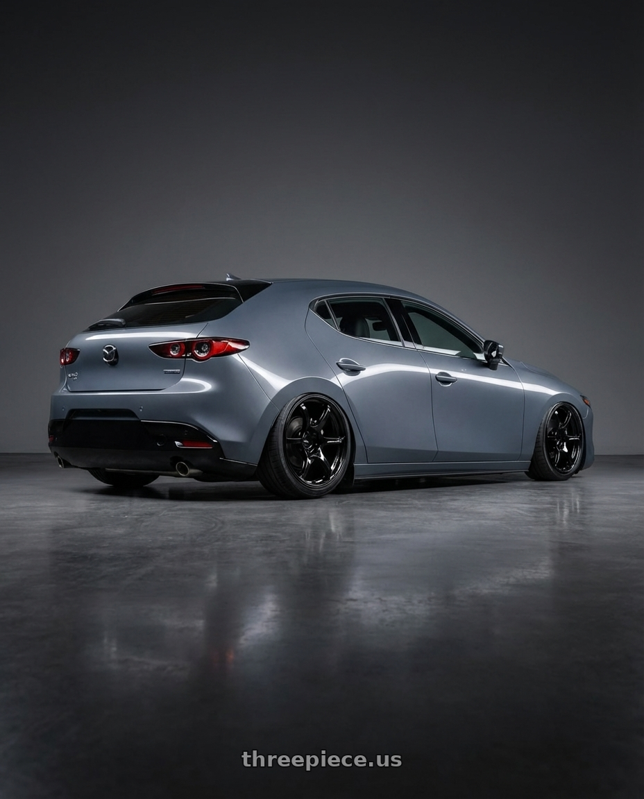 2023 Mazda Mazda3 Turbo with Advan RGIII 5x114.3 18x10+35 Gloss Black wheels rear three quarter view slight stretch tires