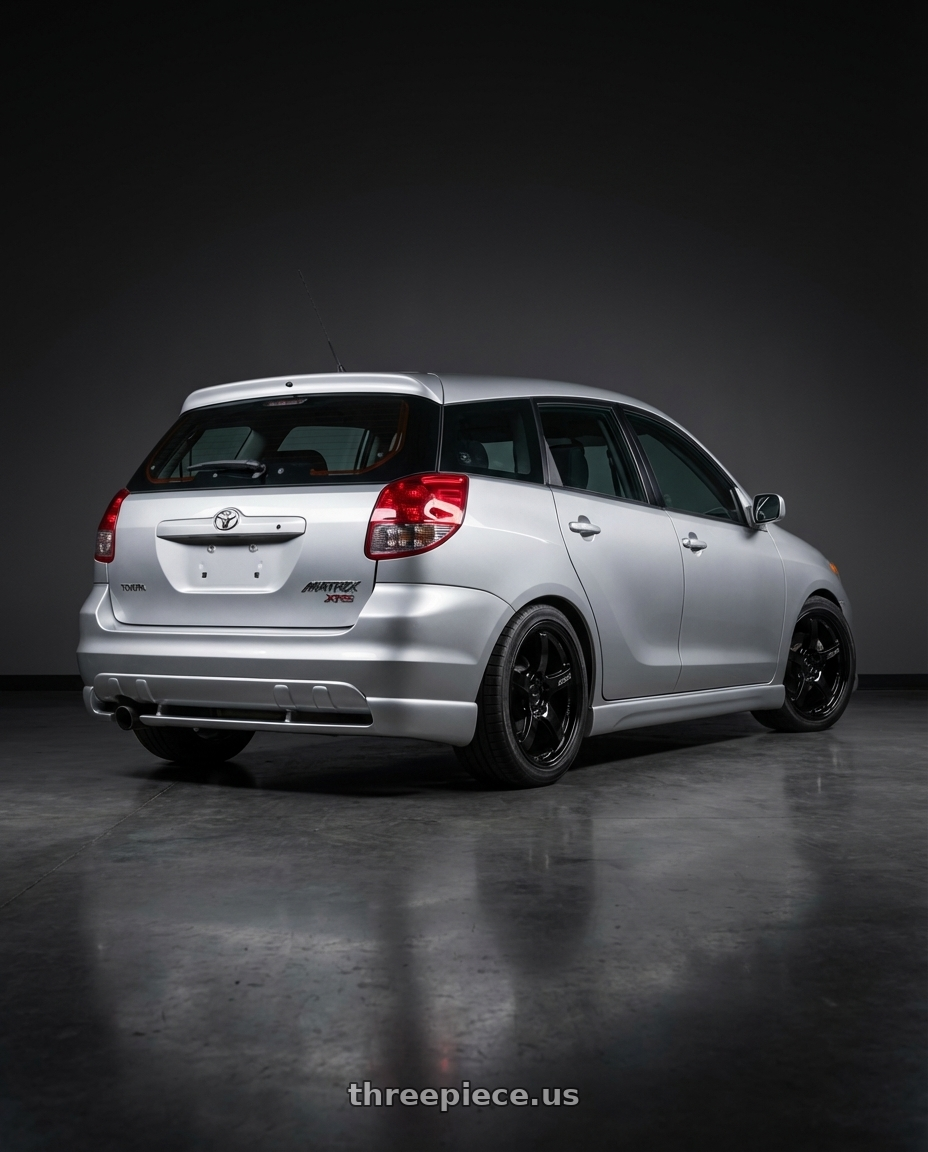 2003 Toyota Matrix Xrs with Gram Lights 57CR 4x100 17x7 +40 Gloss Black wheels rear three quarter view square tires