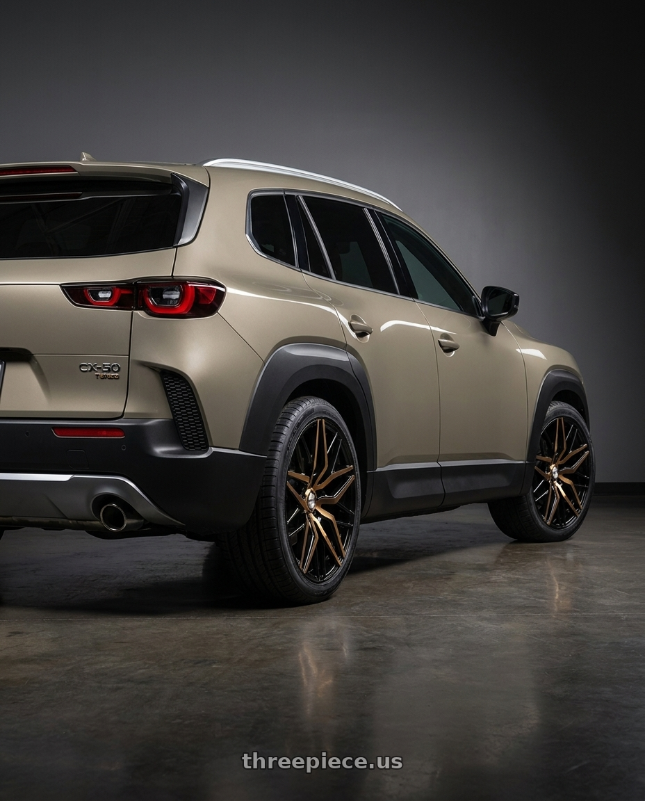 2026 Mazda CX50 Turbo with Shift Spring 5x114.3 18x8 +35 Black Machined Bronze wheels rear three quarter view square tires