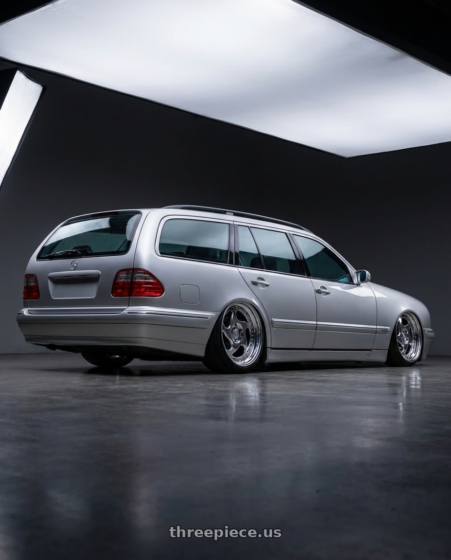 2001 Mercedes-Benz E320 with Heritage Wheel AVUS wheels rear three quarter view slight stretch tires