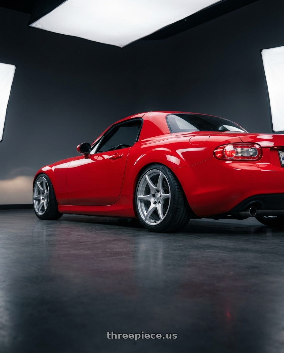 2012 Mazda MX-5 Miata NC with Kansei K11S Tandem 5x114.3 17x9.5 12 Hyper Silver wheels rear three quarter view square tires