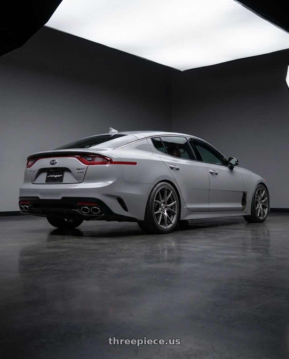 2021 Kia Stinger GT-Line with Forgestar CF5V 5x114.3 19x9 +35 Gloss Anthracite wheels rear three quarter view staggered tires
