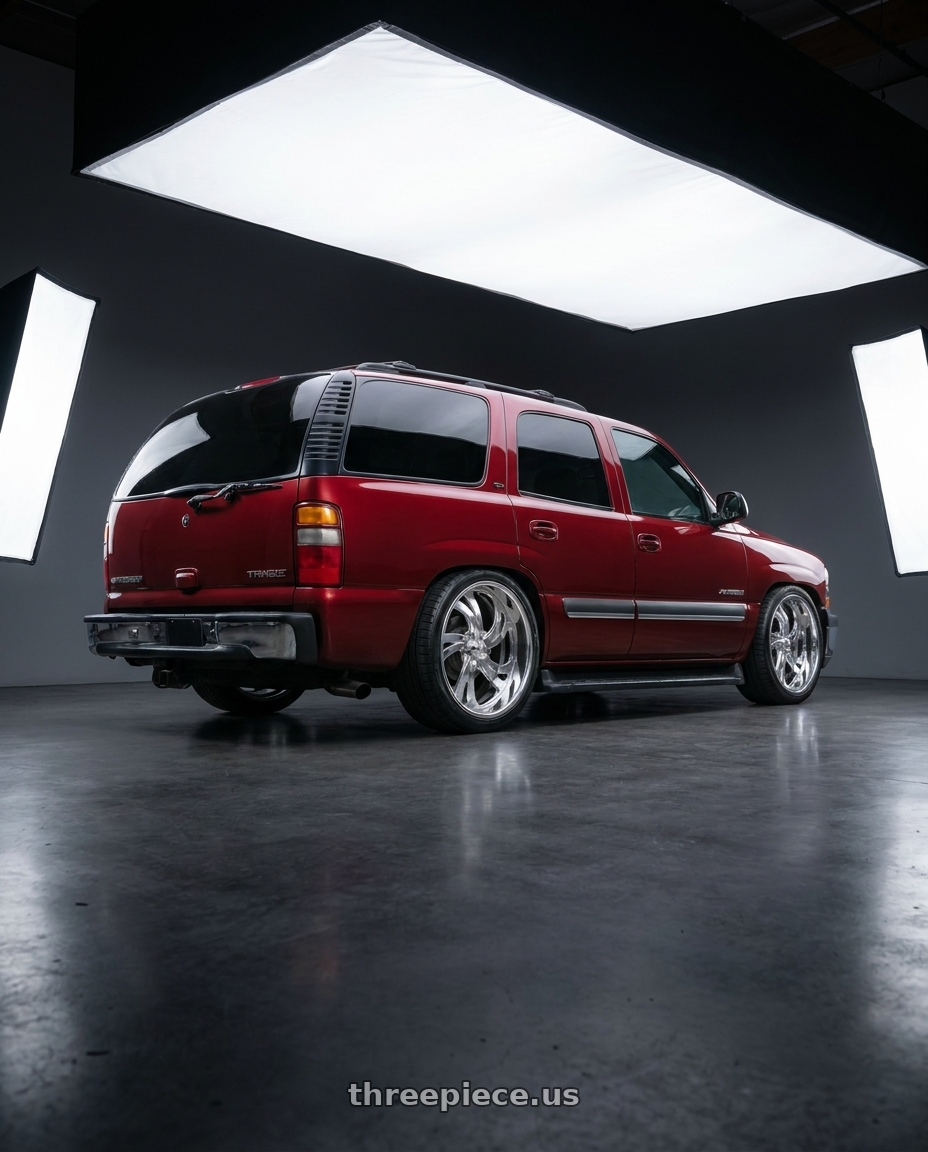 2002 chevy Tahoe with US Mag 1PC KOMPRESSOR 5 5x127 20x8 +1 Polished wheels rear three quarter view slight stretch tires